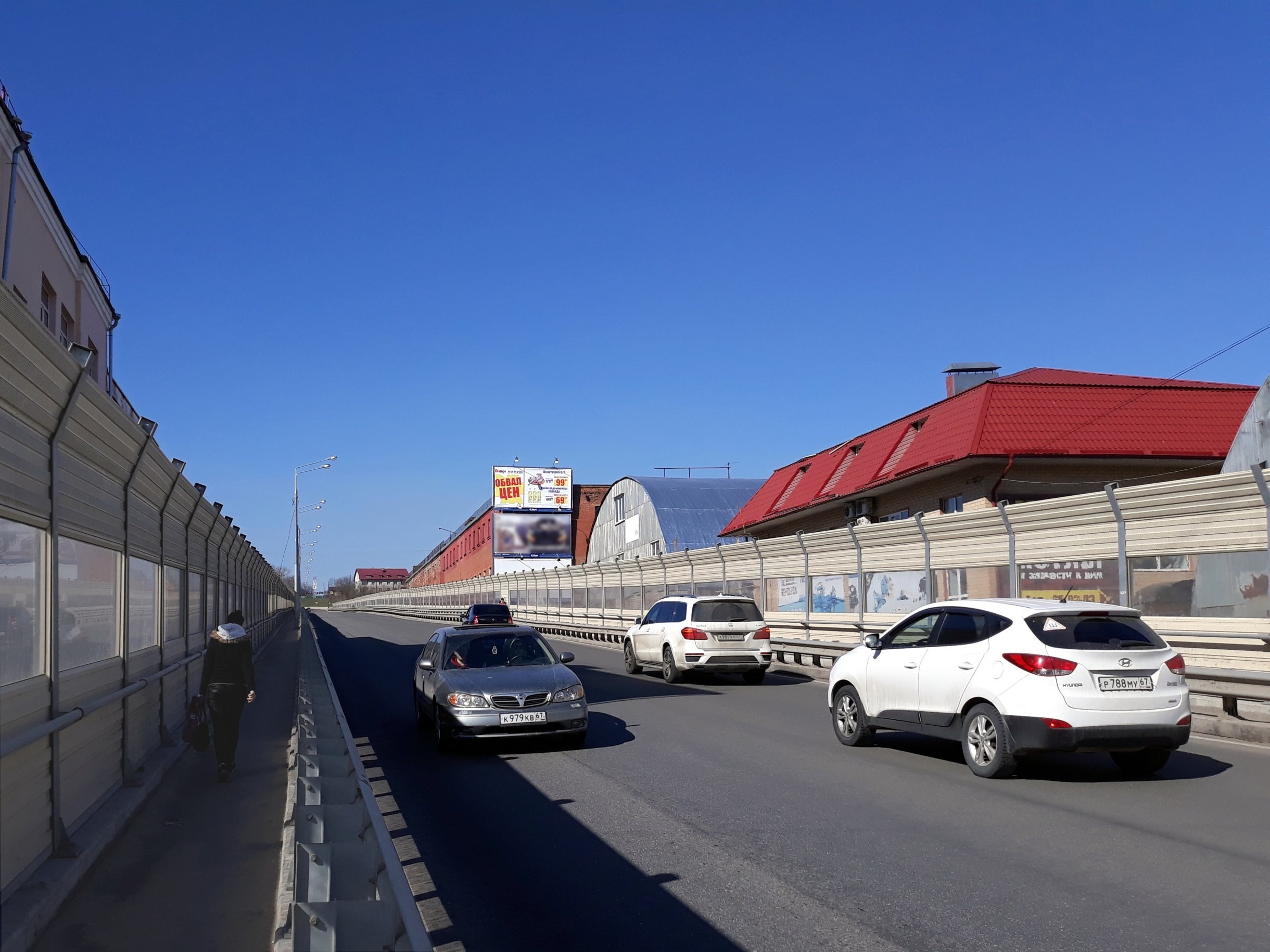 Реклама 3x6 по адресу Беляева ул. / Ново-Ленинградская ул., д. 27 (бранд из центра, верхний)